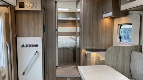 Enjoy comfort and freedom with this new semi-integrated camper