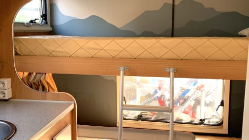 Light and spacious family camper with bunk beds