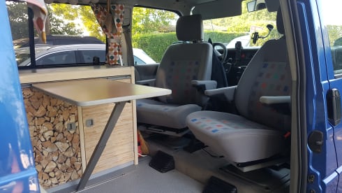 Cheerful Volkswagen camper van with lifting deck and pull-out bed for 2 people