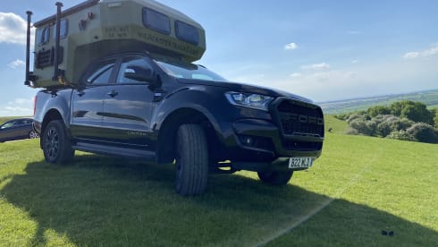 Edinburgh Airport - tardis camper on a pick up truck