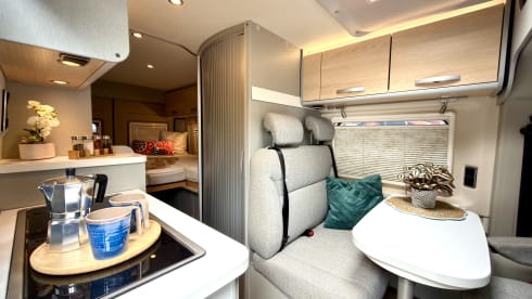 Making Memories 10 – 2024 Hymer Free 602 Automatic with a pop-top roof and a 4-person bike carrier