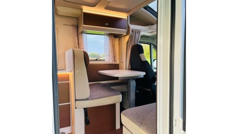 Koosje – Luxury Camper (5 persons) Lengthwise and lifting bed L-seat