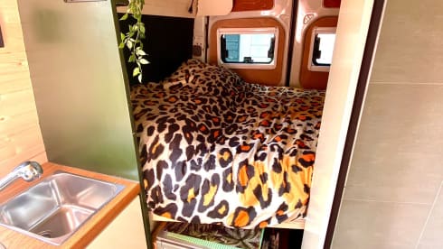 Home is where we park it! – Cool, fresh, self-sufficient 4 person bus camper.