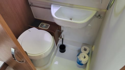 Neat camper van with length beds and solar panels