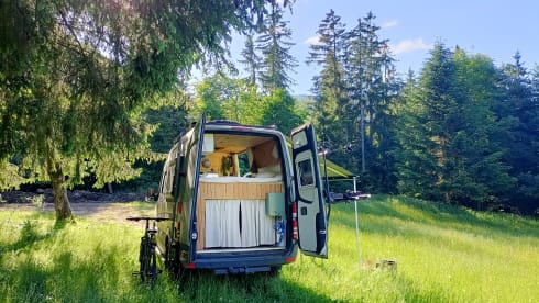 Luxury off-grid Sprinter with unique, bohemian interior! Winter camping