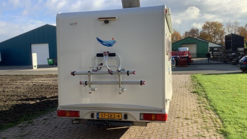 Semi-integrated camper