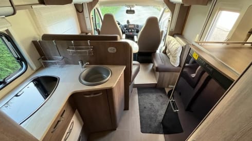 Bürstner/Fiat Ducato semi-integrated from 2016 with full leather upholstery.