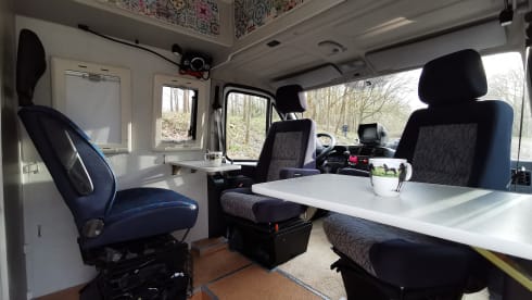 On an adventure with a reliable bus camper.