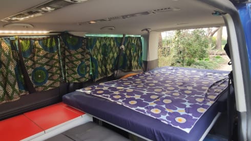 bluesky – vw t5 long wheelbase, free on the road surrounded by a blue sky