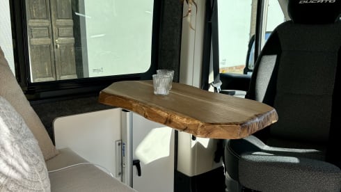 Luxurious off-grid bus from 2021 with a super atmospheric interior 