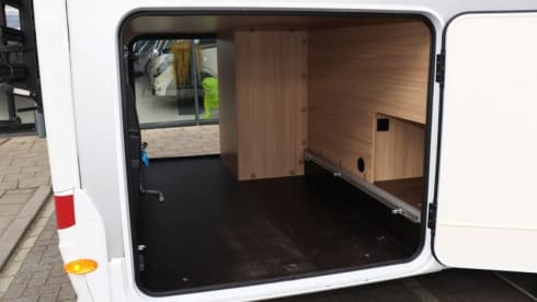 T69L – Complete HomeCar family camper with motor air conditioning and awning,