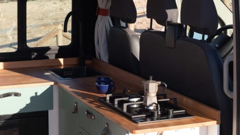 Compact off-grid Peugeot Boxer with length bed for 2 people