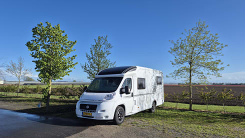 Nice compact 2 person camper with single beds.