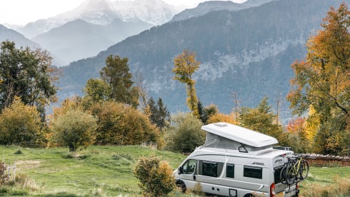 Fijnja – Luxury 4 pers. Pössl bus camper with sleeping lifting roof from 2019