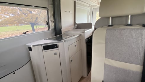 Beautiful 2-person Ford camper van from 2023 with luxurious furnishings