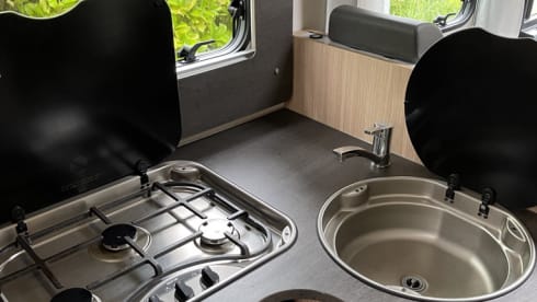 13/21 – Luxurious, complete camper with length beds and a pull-down bed!