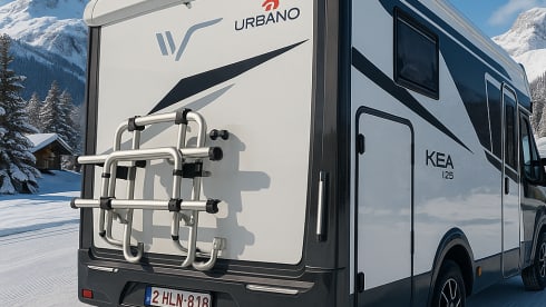 Luxury 4-person motorhome with bicycle rack and tow bar, model 2026