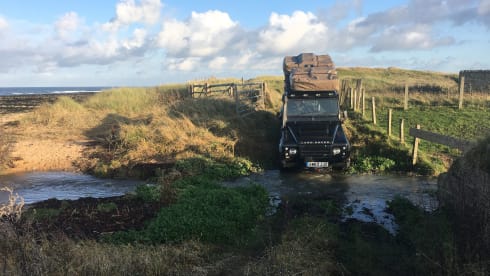 STEVENSON – Land Rover Defender 110 with Rooftop Tent & Awning | Carries 5, Sleeps 3