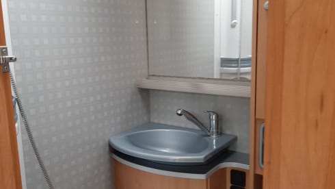 Mr. Blue  – Bürstner Merano with air conditioning and fixed bed 2005