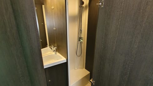 Luxury mobile home with spacious beds and a very large garage