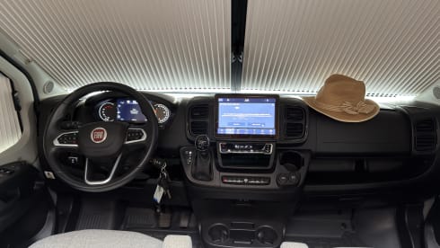 Making Memories 10 – 2024 Hymer Free 602 Automatic with a pop-top roof and a 4-person bike carrier