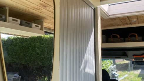 Home is where we park it! – Cool, fresh, self-sufficient 4 person bus camper.