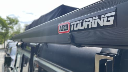 Great adventures with the family, tough Landrover Defender with roof tent