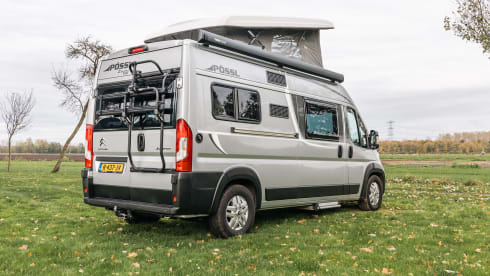 Fijnja – Luxury 4 pers. Pössl bus camper with sleeping lifting roof from 2019
