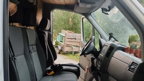 Luxury off-grid Sprinter with unique, bohemian interior! Winter camping