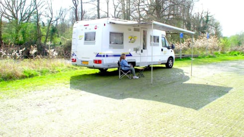 Bürstner Family Camper 4 persons, with bicycle carrier.