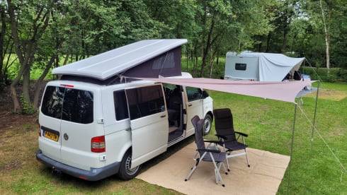 4-person Volkswagen with pop-up roof and long wheelbase for extra space