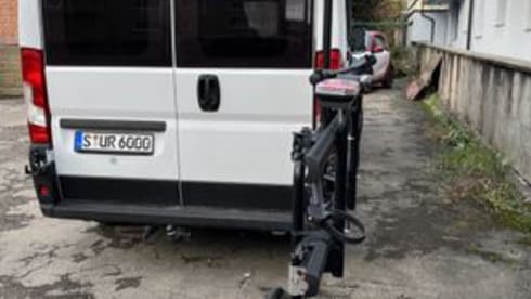 Cara – Van (6 m) from Weinberg with pop-up roof for rent