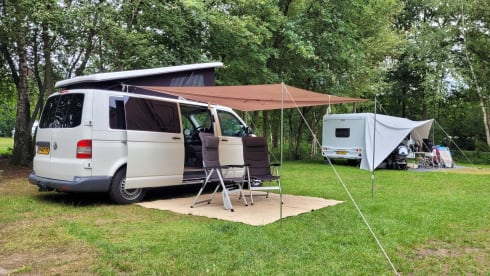 4-person Volkswagen with pop-up roof and long wheelbase for extra space