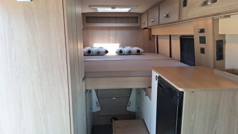 Spazio 4 – AmorA-Camper mit Fahrradgarage und Längsbett 180x200cm