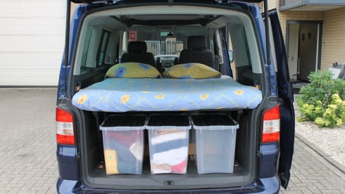 powerful VW T5 Multivan camper van with spacious Reimo pop-up roof