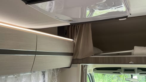 Spacious 7-person Rimor alcove family camper from 2019