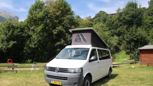 4-person Volkswagen with pop-up roof and long wheelbase for extra space