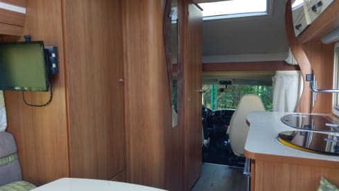 Adventurous and comfortable 2 person alcove camper