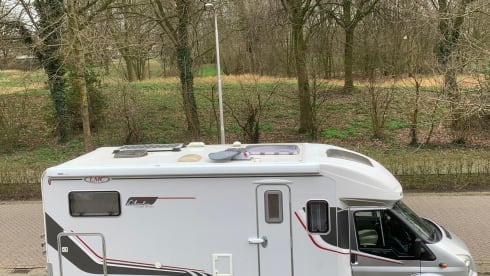 4p LMC semi-integrated with awning, air conditioning and cruise control.
