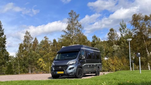 vakantiehuisje op 4 wielen – 2p Karmann bus, with air conditioning in living area