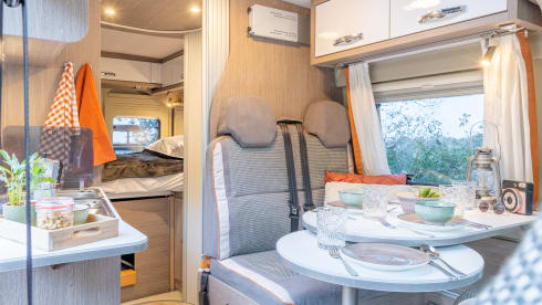 Fijnja – Luxury 4 pers. Pössl bus camper with sleeping lifting roof from 2019