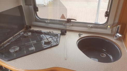 Nice 5 person Dethleffs alcove camper.