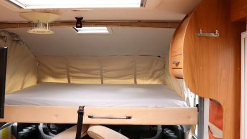 Camper with top layout
