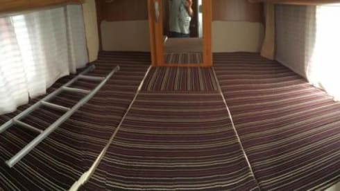 B-type – Luxury motorhome, semi-integrated with length beds