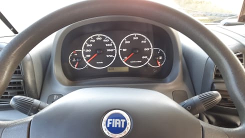 Spacious Fiat 2006 with a fixed bed, air conditioning and a very cozy interior.