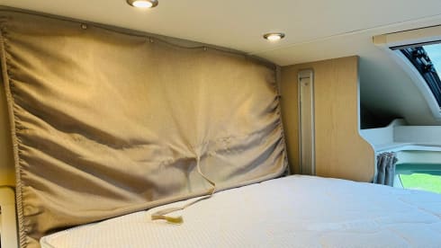 Koosje – Luxury Camper (5 persons) Lengthwise and lifting bed L-seat