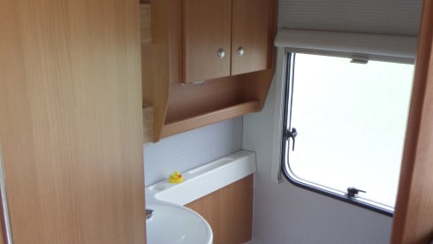 Compact family camper with bunk bed