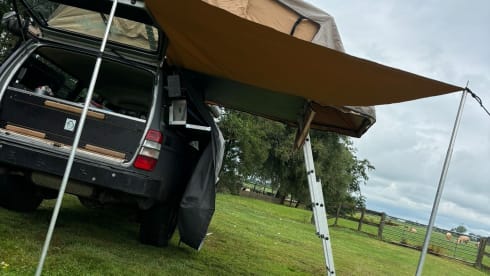 The Brick  – Volvo station Polar 245 roof tent incl complete camping equipment