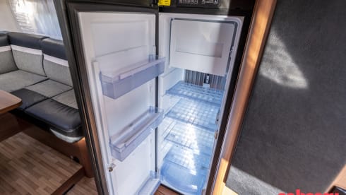 LMC Integral Camper with round seating layout