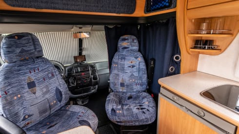 Compact semi-integrated motorhome